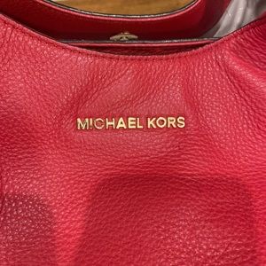Michael Kors medium size handbag in very good condition. Hobo style satchel